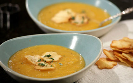 Carrot soup with potato garnish